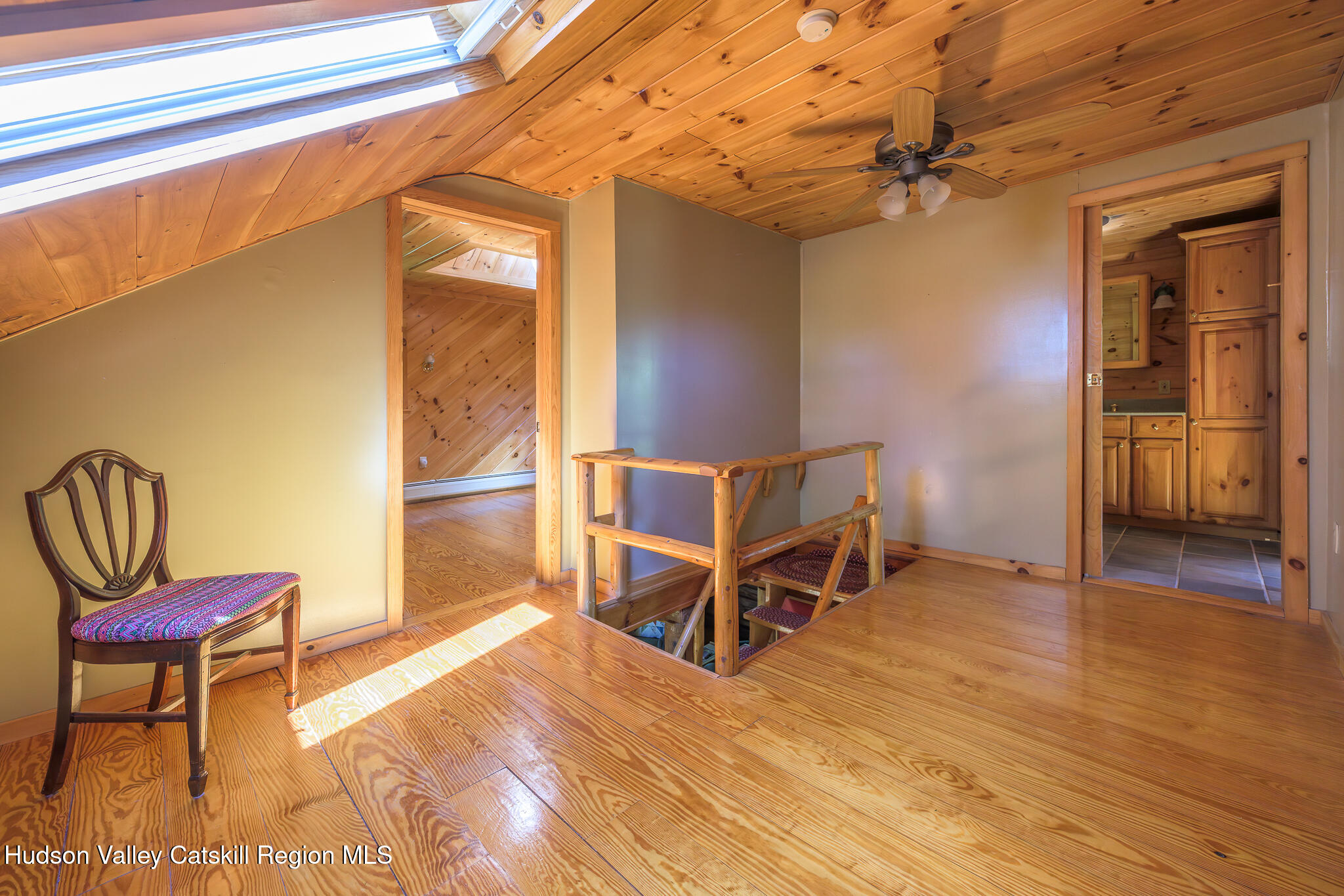 34 Queechy Shore Beach Road Canaan, NY 12029 - Photo 17 of 31 a view of a room with wooden floor and windows