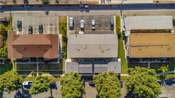 a view of a swimming pool with outdoor seating