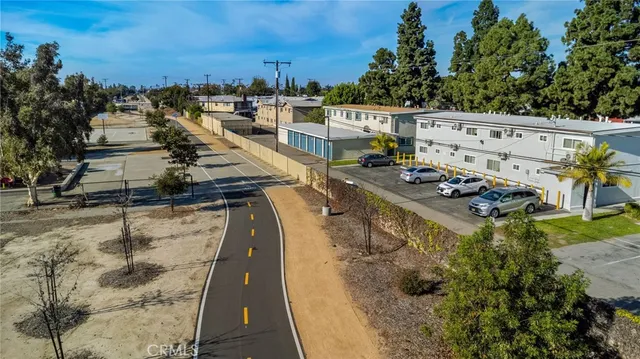 a backyard of a house with outdoor seating