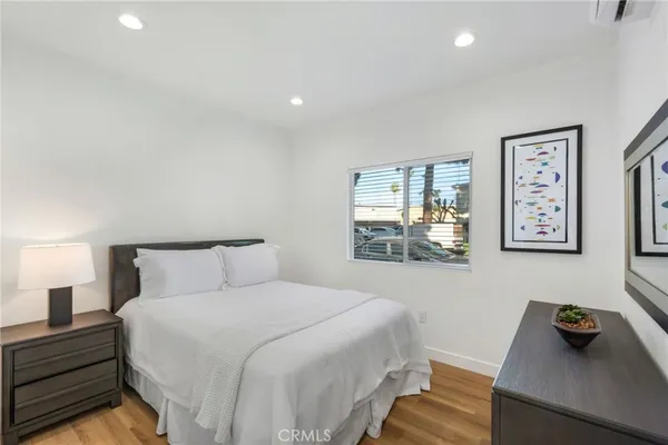 a bathroom with a toilet a sink and shower