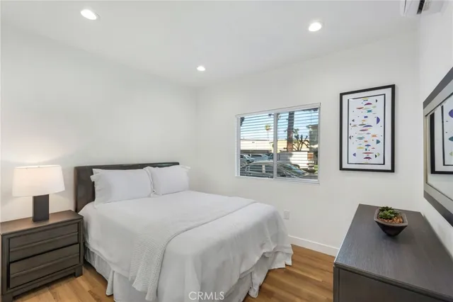 a bathroom with a toilet a sink and shower
