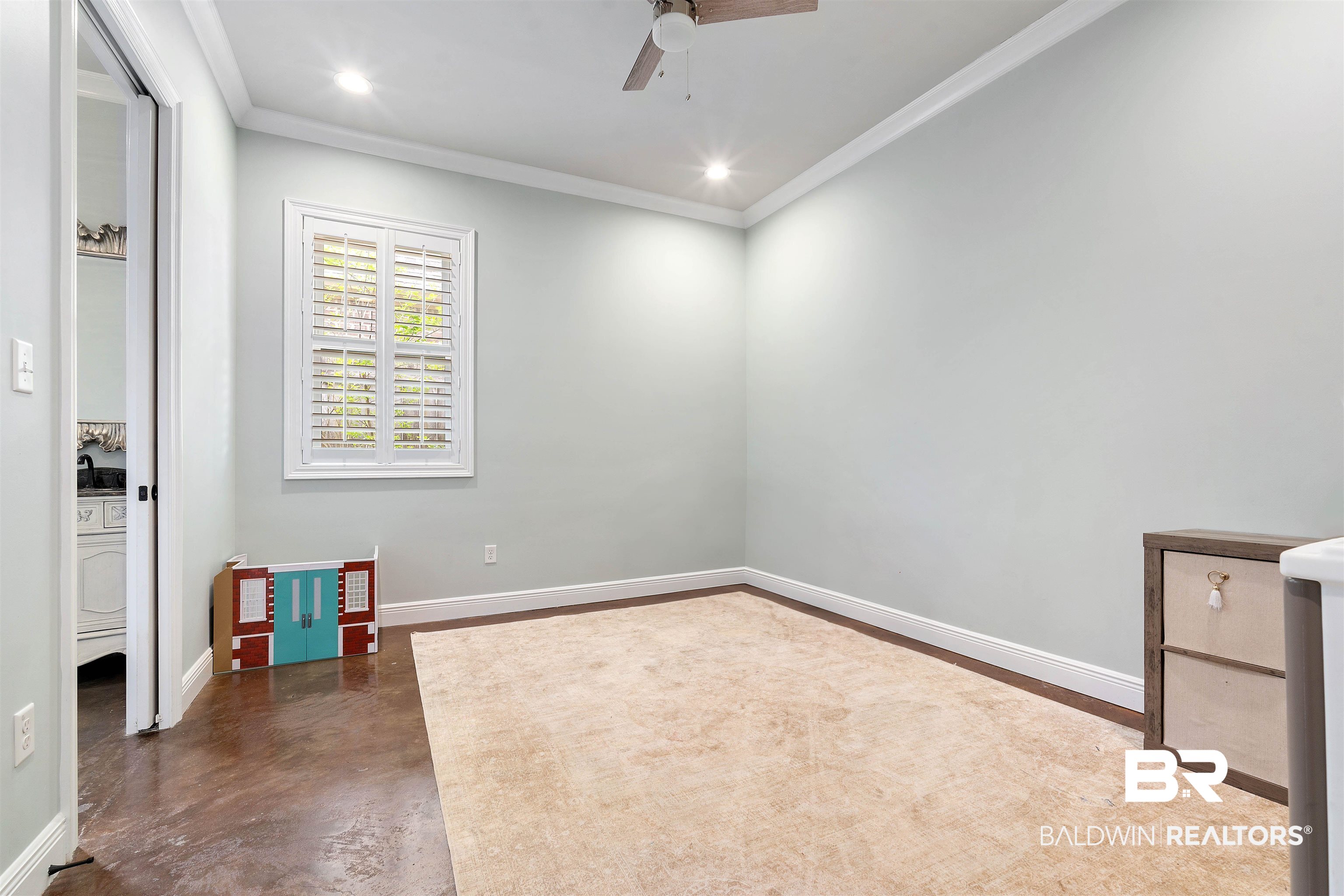 3584 Rue Royal Mobile, AL 36693 - Photo 26 of 35 Interior space featuring ornamental molding, a ceiling fan, finished concrete flooring, recessed lighting, and baseboards