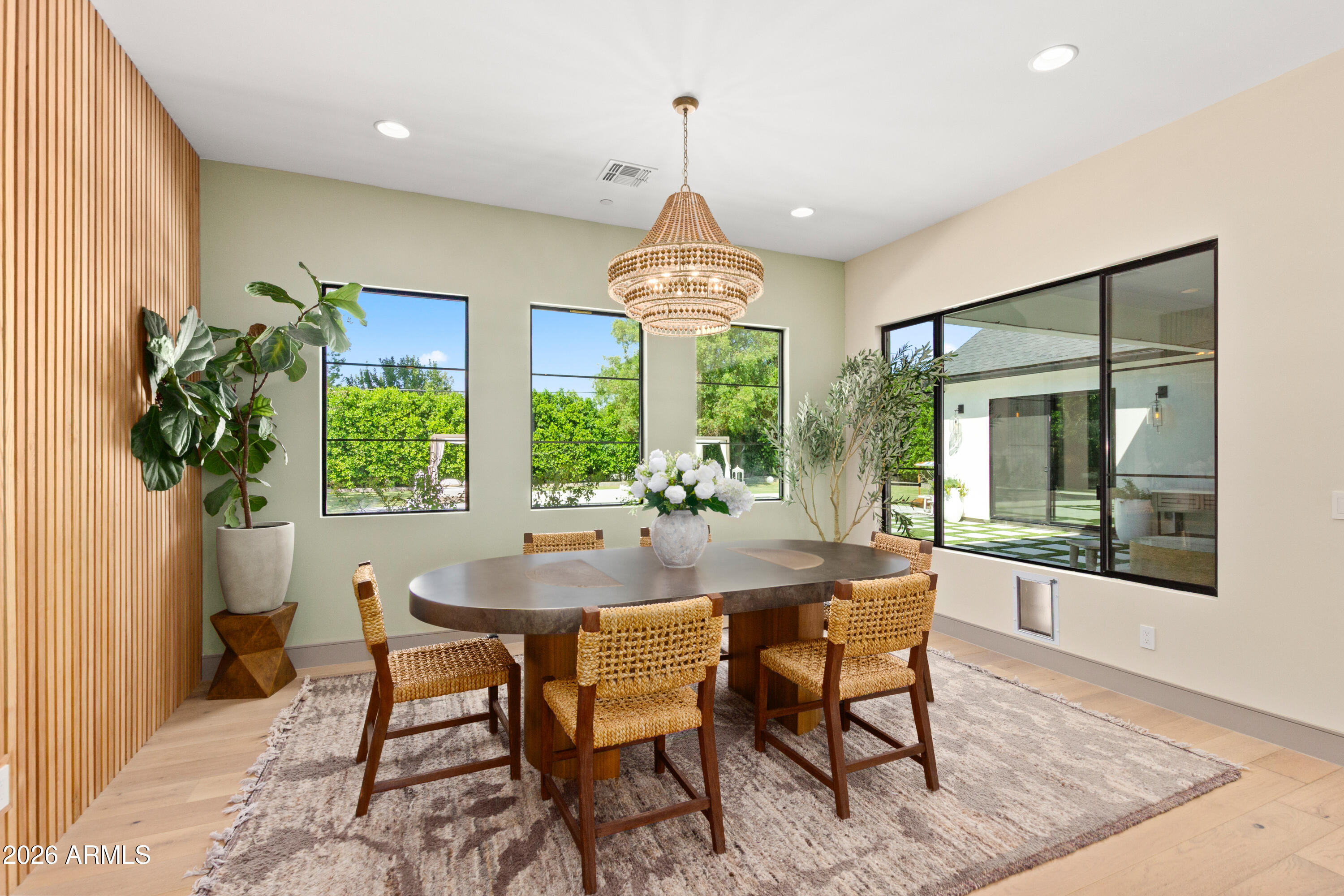 2912 East Pierson Street Phoenix, AZ 85016 - Photo 20 of 86 a dining room with furniture window wooden floor