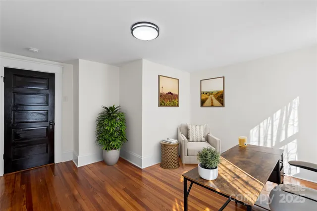 a bedroom with a bed and furniture