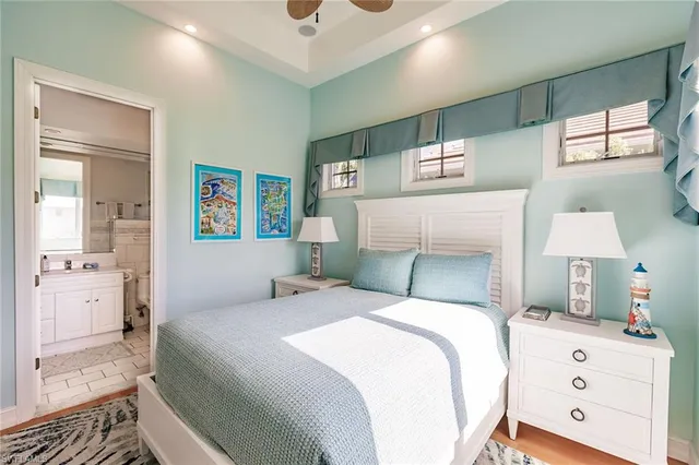 a bedroom with a bed and a cabinets