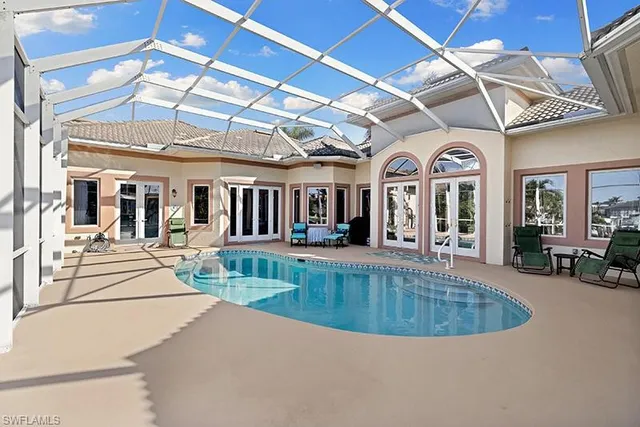 a view of a house with a swimming pool
