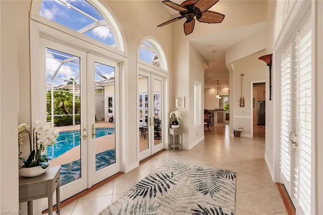 a bedroom with furniture and a wooden floor