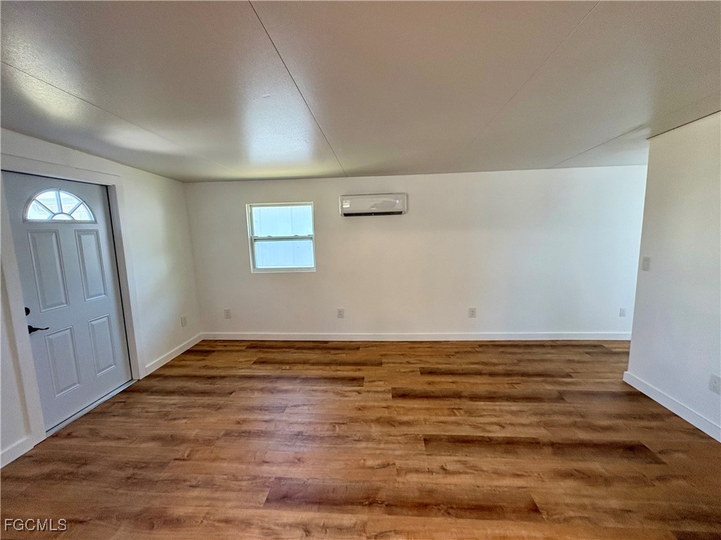 5675 Pine Island Road St. James City, FL 33956 - Photo 11 of 28 a view of an empty room and window