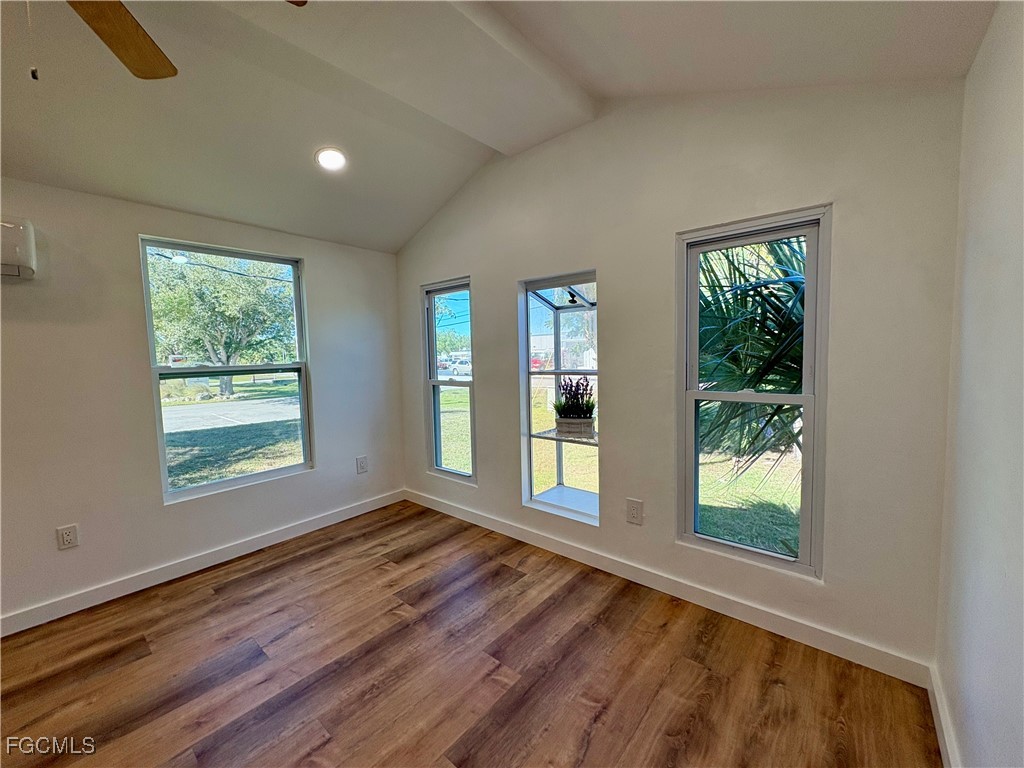 5675 Pine Island Road St. James City, FL 33956 - Photo 12 of 28 a view of an empty room with a window