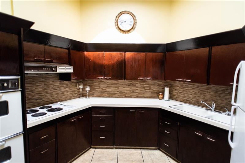 151 View Street Indiana, PA 15701 - Photo 6 of 15 This kitchen features a unique layout conducive for cooking, and a charming skylight letting natural light in.