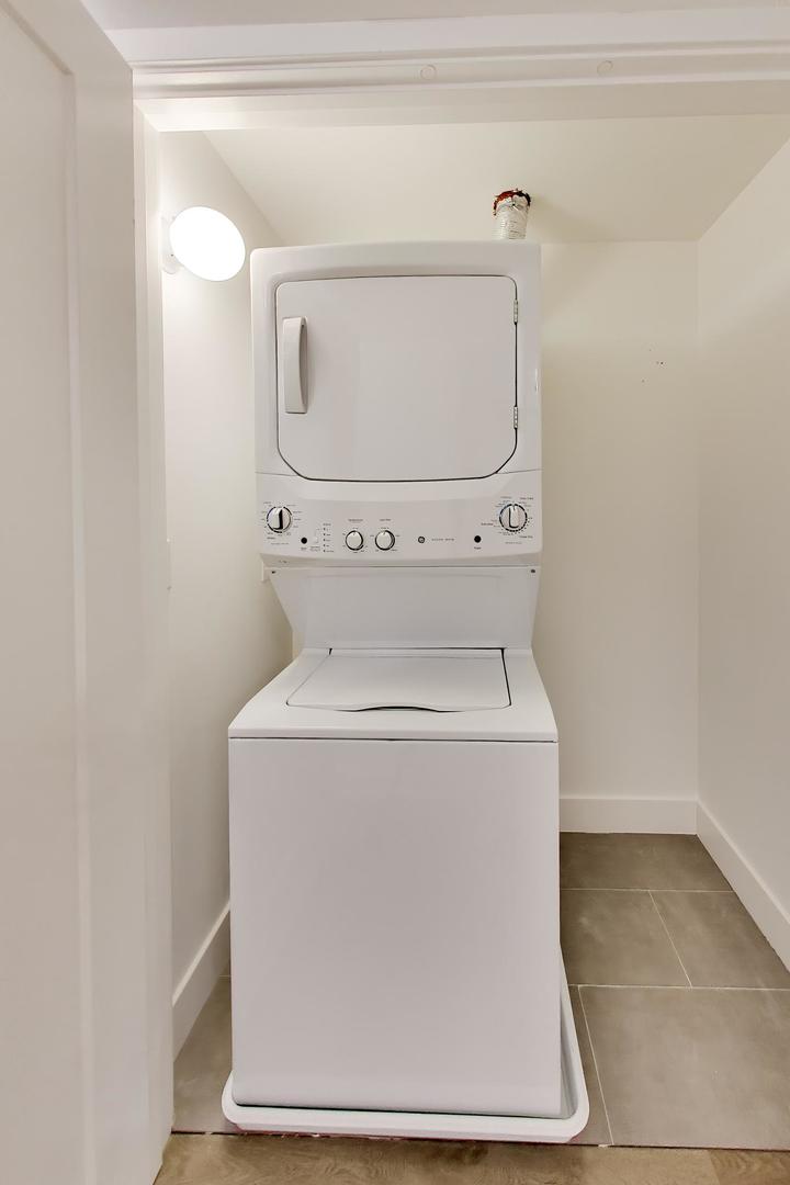 4117 South Indiana Avenue, Unit 1R Chicago, IL 60653 - Photo 24 of 24 a utility room with dryer and washer