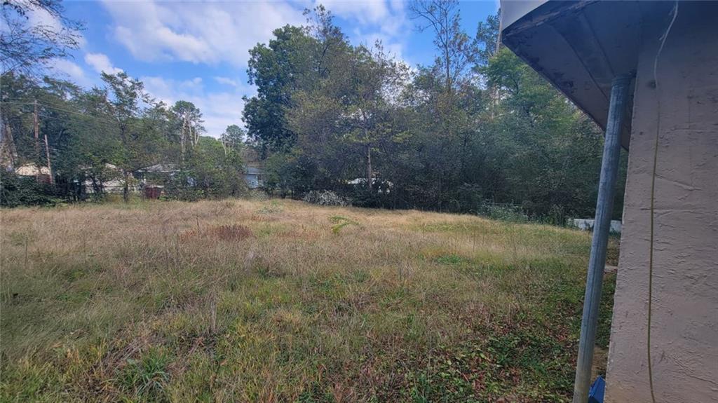 18 Butler Circle Rome, GA 30165 - Photo 2 of 2 a view of a field with trees in the background