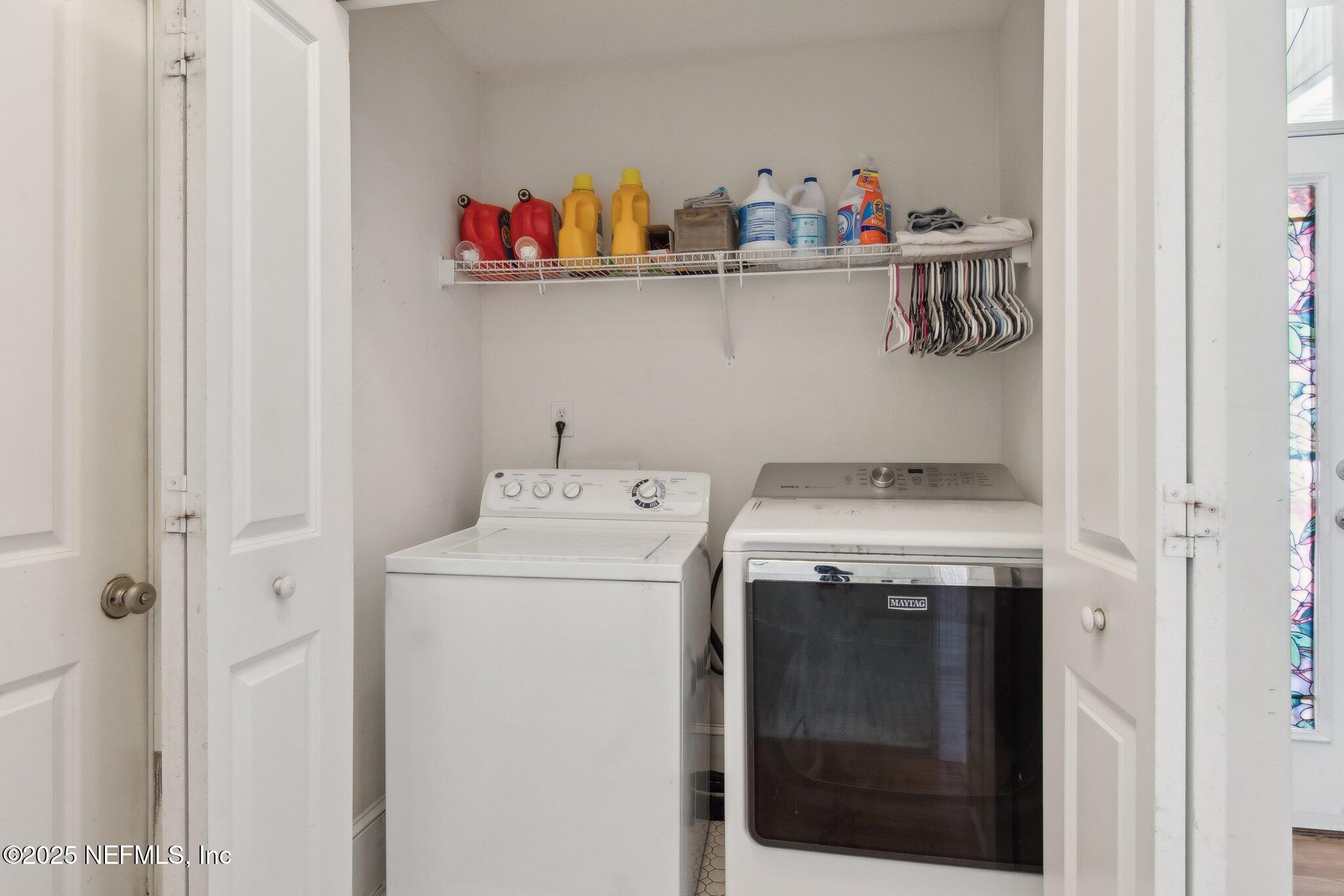 45107 Booth Street Callahan, FL 32011 - Photo 15 of 49 a utility room with dryer and washer