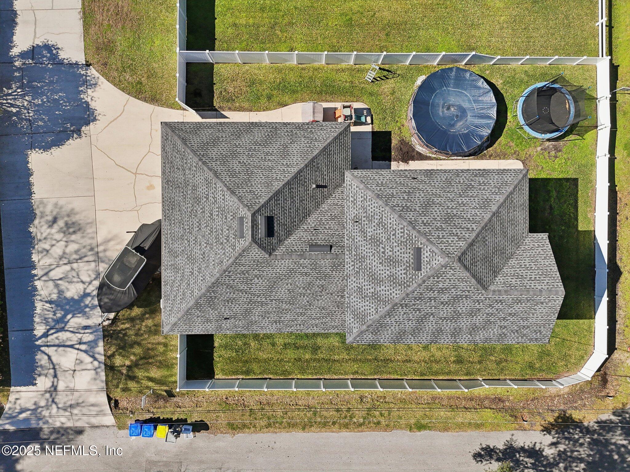 45107 Booth Street Callahan, FL 32011 - Photo 23 of 49 an aerial view of a house with a swimming pool