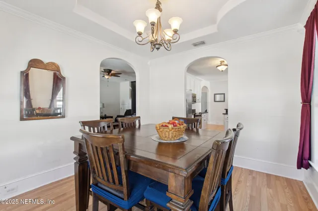 a view of a dining room with furniture window and outside view