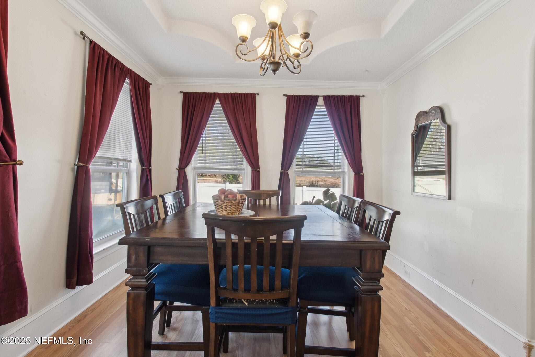 45107 Booth Street Callahan, FL 32011 - Photo 27 of 49 a view of a dining room with furniture window and outside view