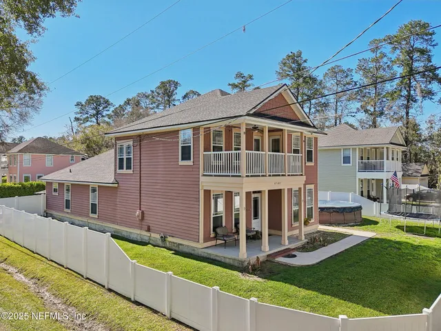 a house with trees in the background