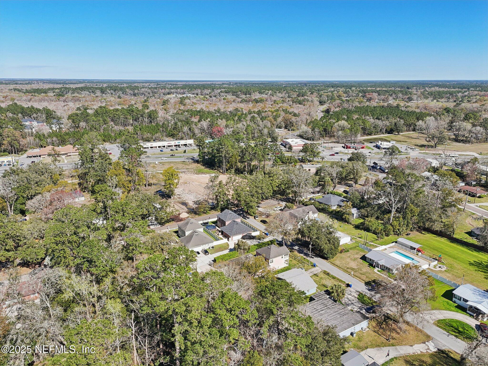 45107 Booth Street Callahan, FL 32011 - Photo 46 of 49 an aerial view of residential houses with outdoor space