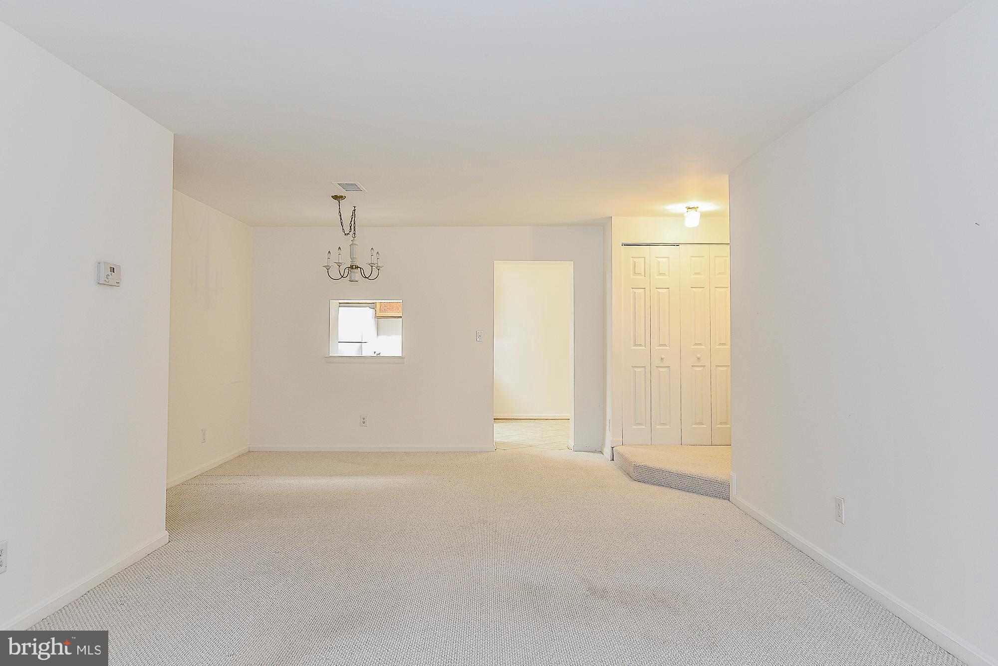 5938 Cove Landing Road, Unit 102A Burke, VA 22015 - Photo 3 of 19 Separate dinning room and living room combo!