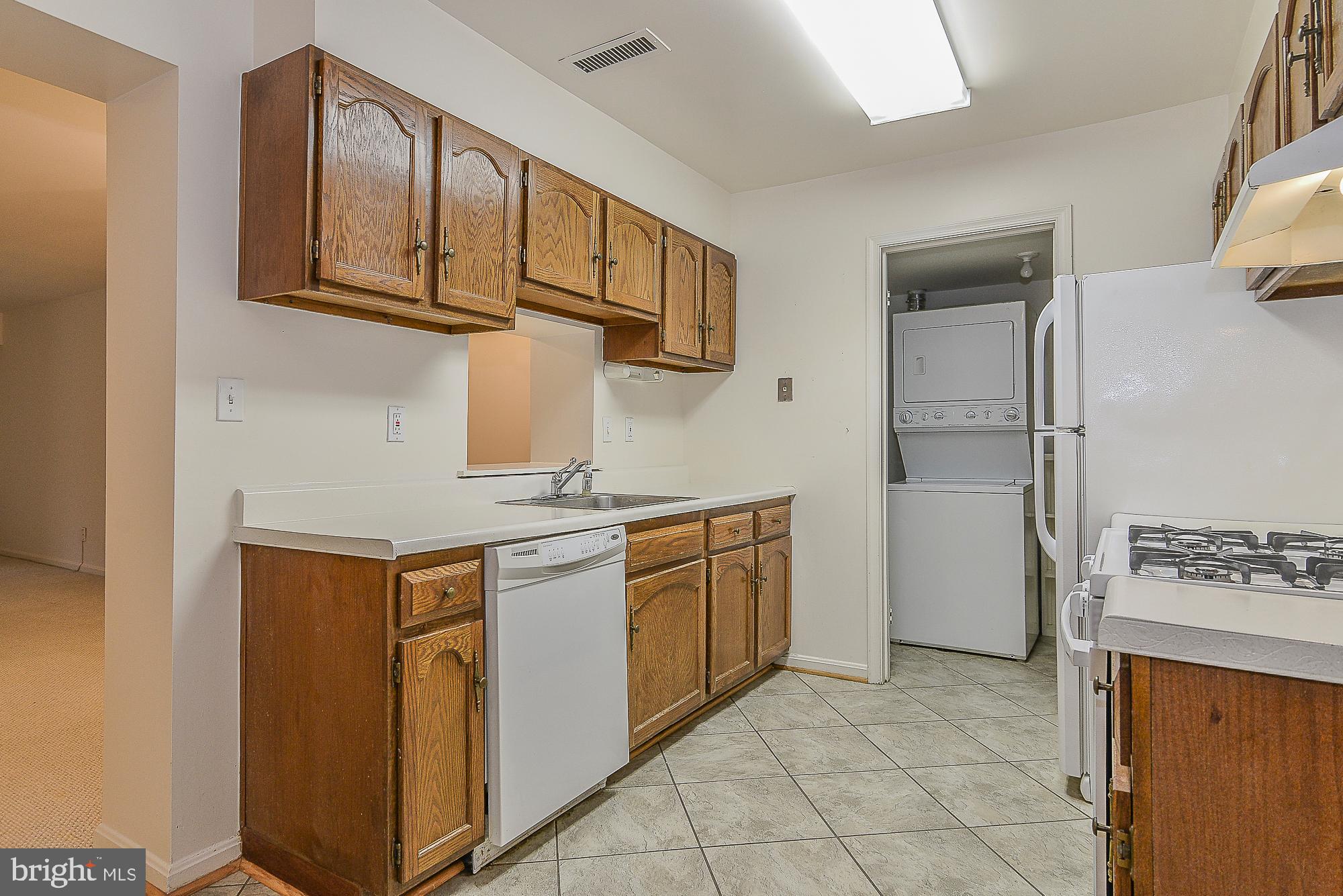 5938 Cove Landing Road, Unit 102A Burke, VA 22015 - Photo 7 of 19 Conveniently located pantry/laundry room !
