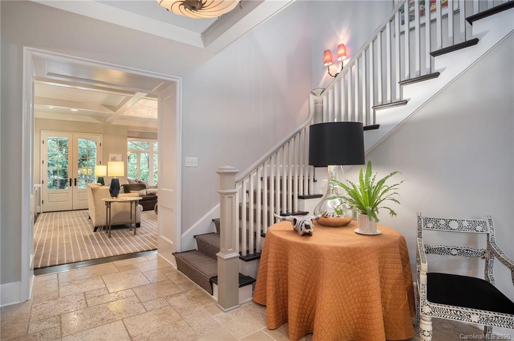 1500 Andover Road Charlotte, NC 28211 - Photo 2 of 24 a living room with furniture and a potted plant