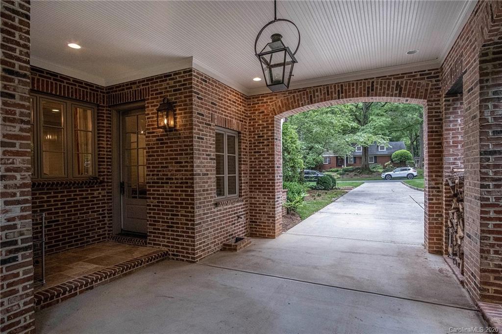 1500 Andover Road Charlotte, NC 28211 - Photo 24 of 24 a view of a porch with a table and chairs