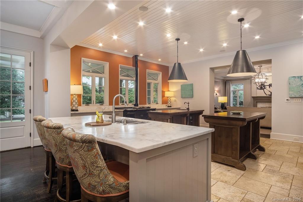 1500 Andover Road Charlotte, NC 28211 - Photo 5 of 24 a view of a dining room with furniture and chandelier