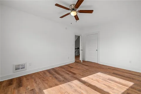 a view of a big room with carpet