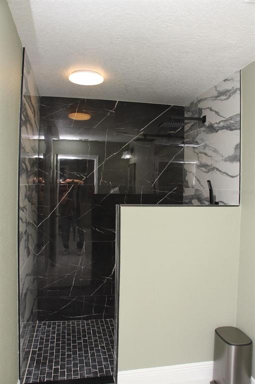 1991 Sanderlin Point Loop Apopka, FL 32703 - Photo 9 of 27 a bathroom with a shower