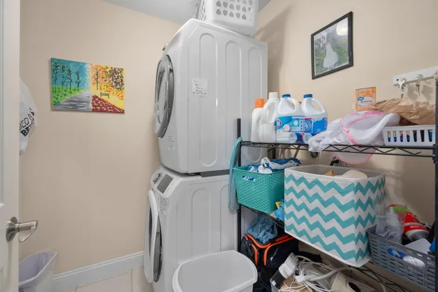 a room with furniture and a mirror