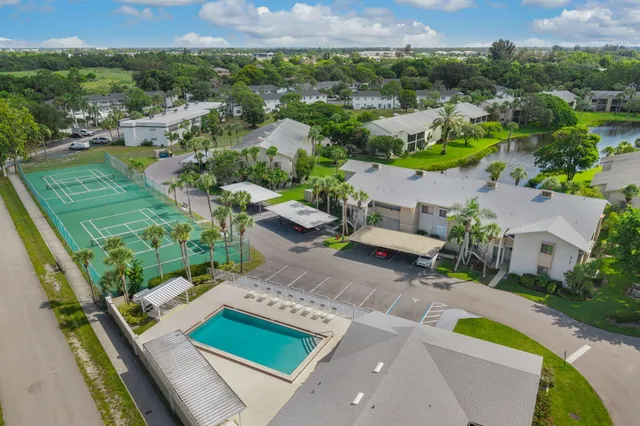 an aerial view of a house with a garden