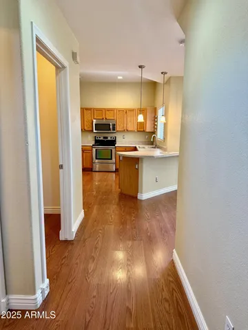 a view of kitchen with wooden floor