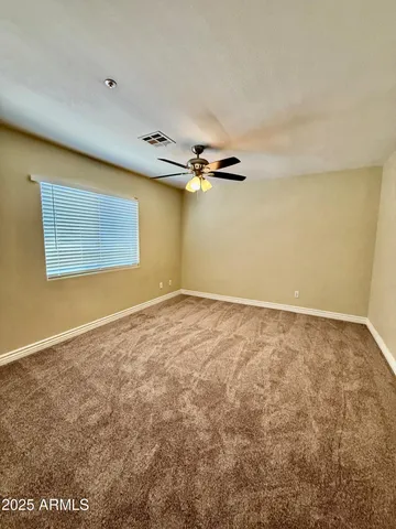 en empty room with windows