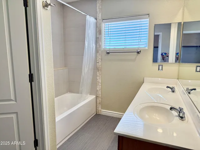 a bathroom with a sink and a bathtub