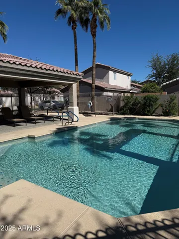 a view of a porch and garden
