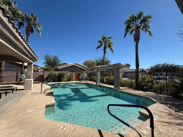 a view of a backyard with a patio