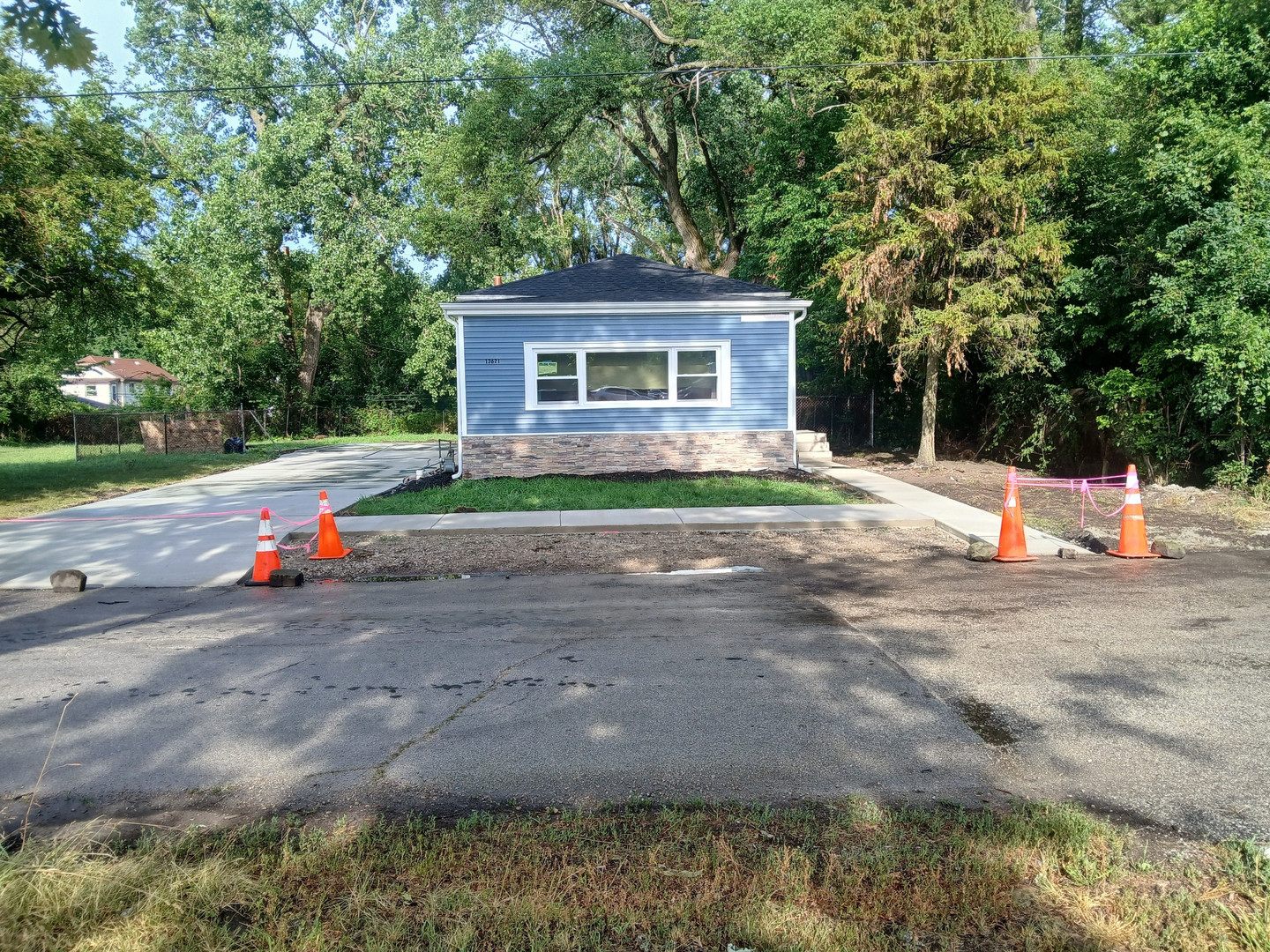 13621 Homan Avenue Robbins, IL 60472 - Photo 1 of 25 a backyard of a house with barbeque oven table and chairs