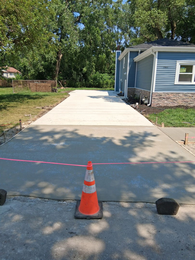 13621 Homan Avenue Robbins, IL 60472 - Photo 3 of 25 a backyard of a house with barbeque oven table and chairs