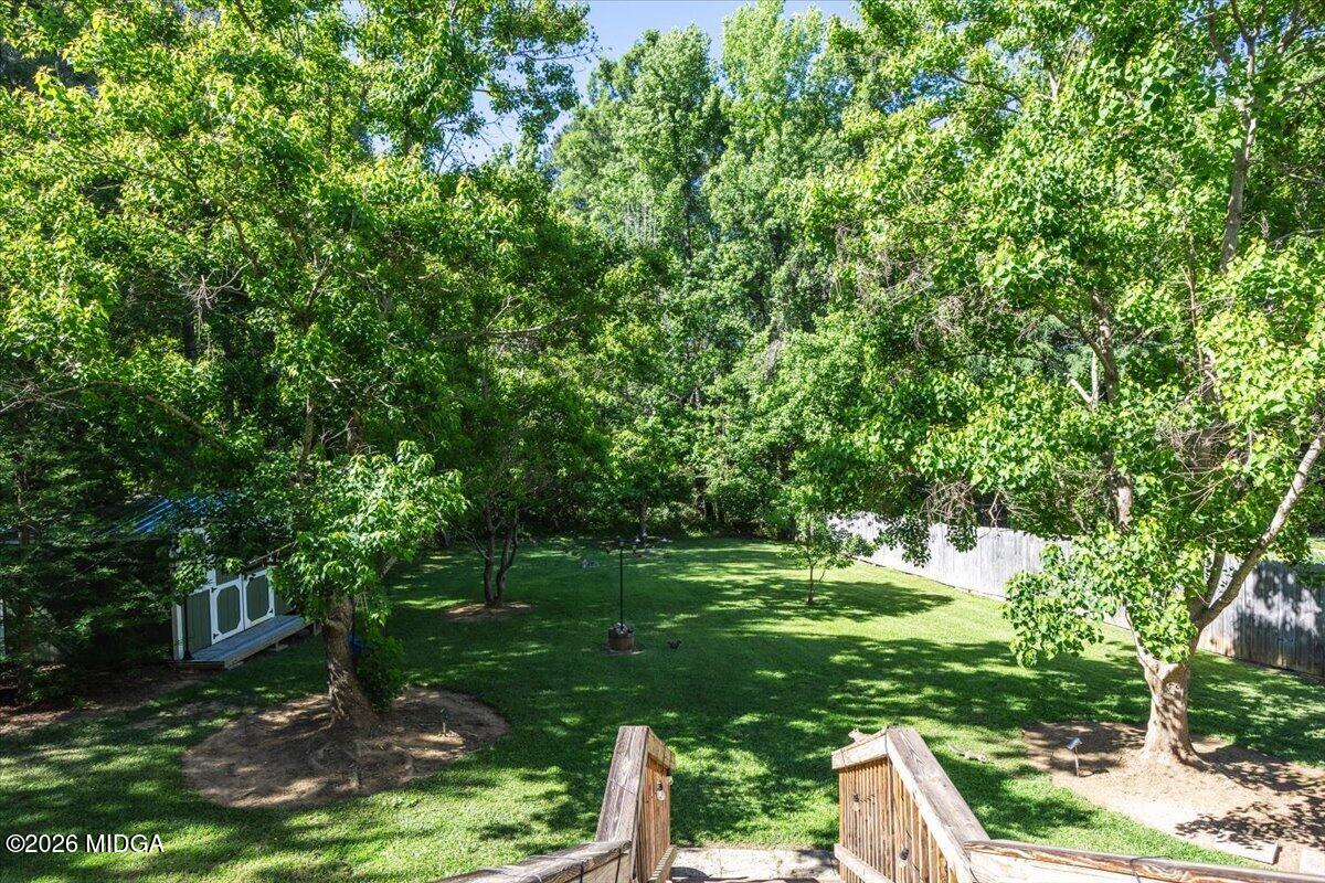619 Grayridge Road Gray, GA 31032 - Photo 33 of 40 a big yard with lots of green space and plants