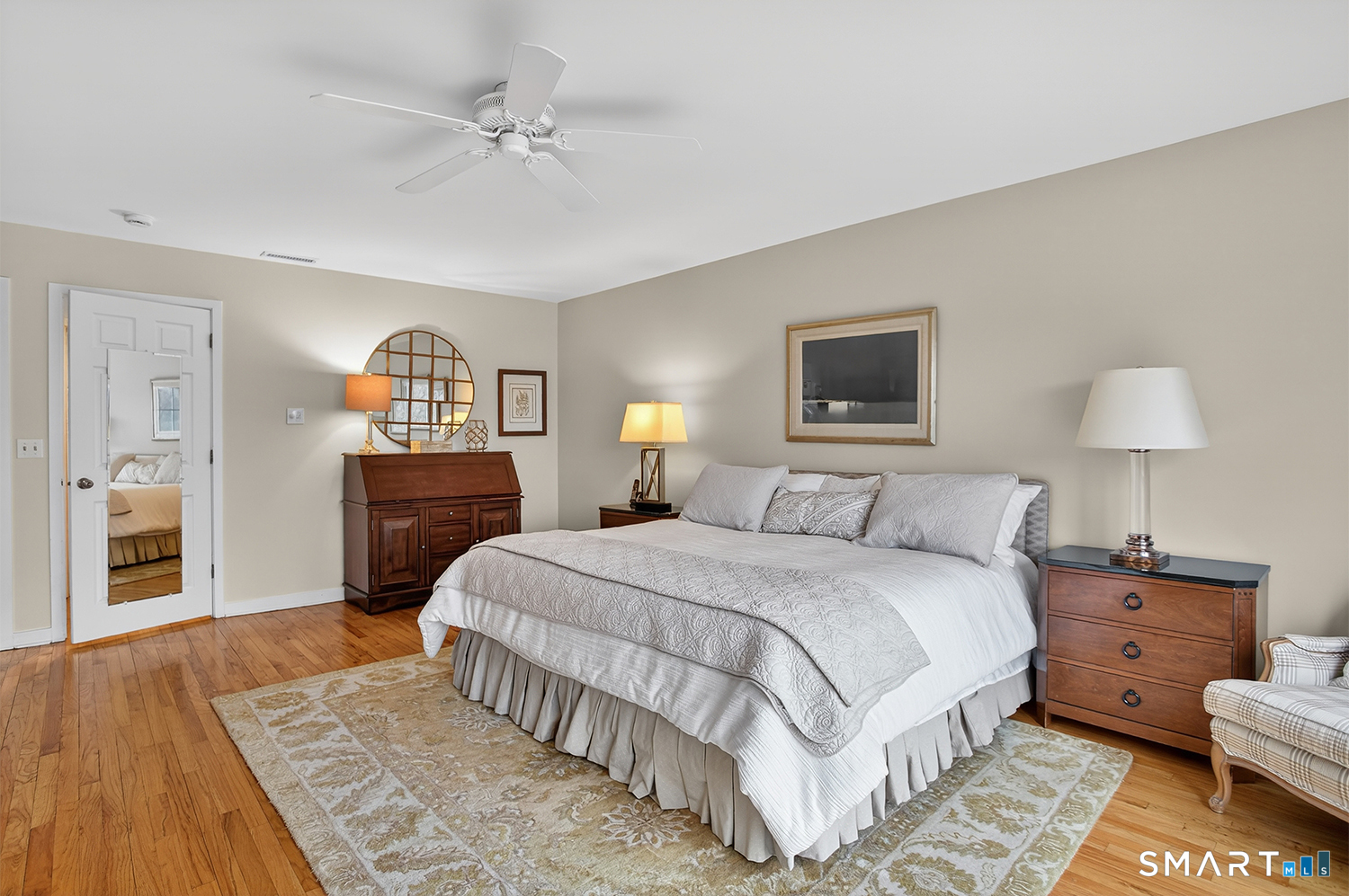 23 Balmaha Cl Fairfield, CT 06825 - Photo 15 of 29 a bedroom with a bed and a table