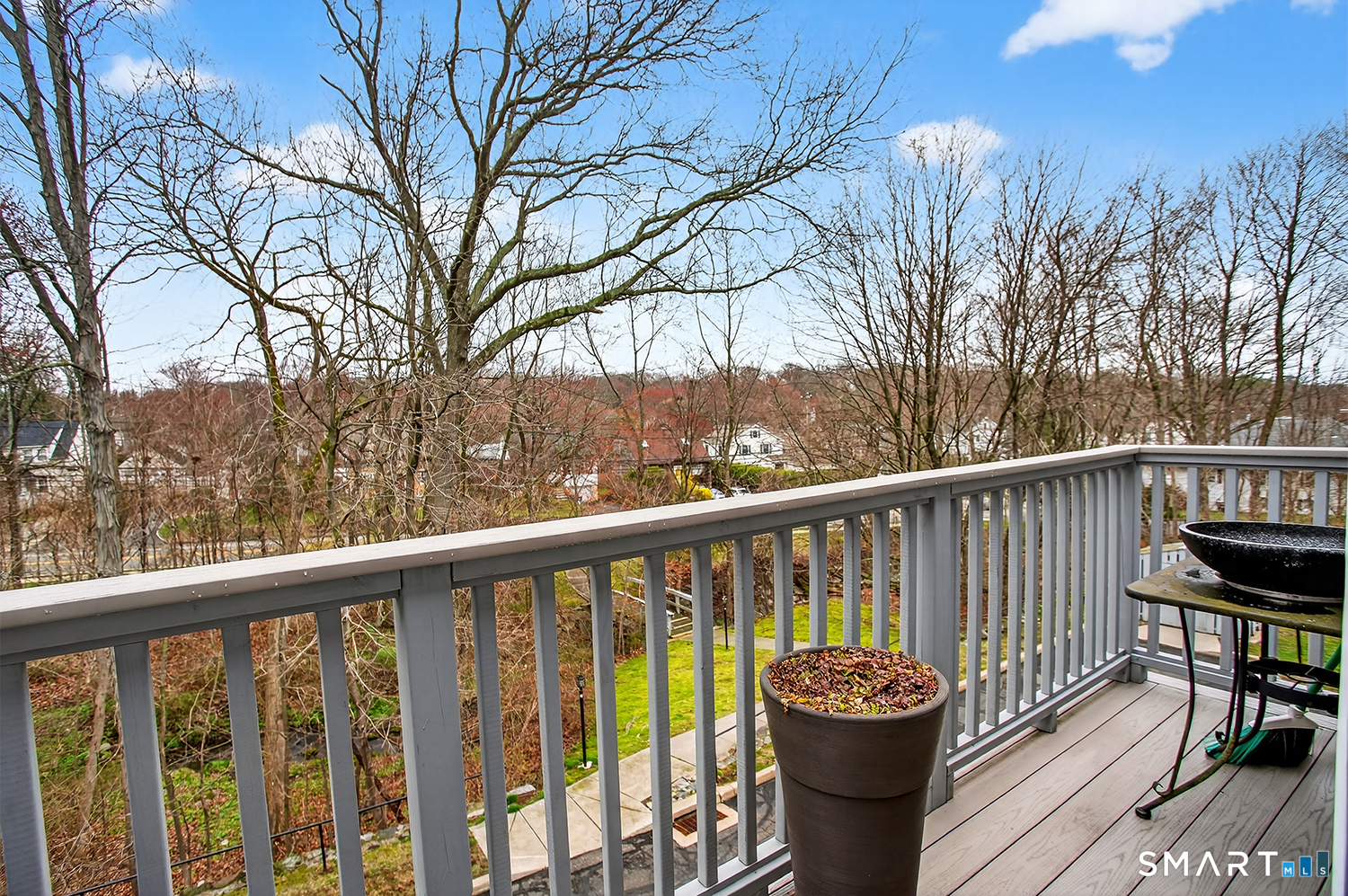 23 Balmaha Cl Fairfield, CT 06825 - Photo 17 of 29 a view of a two chairs on the deck