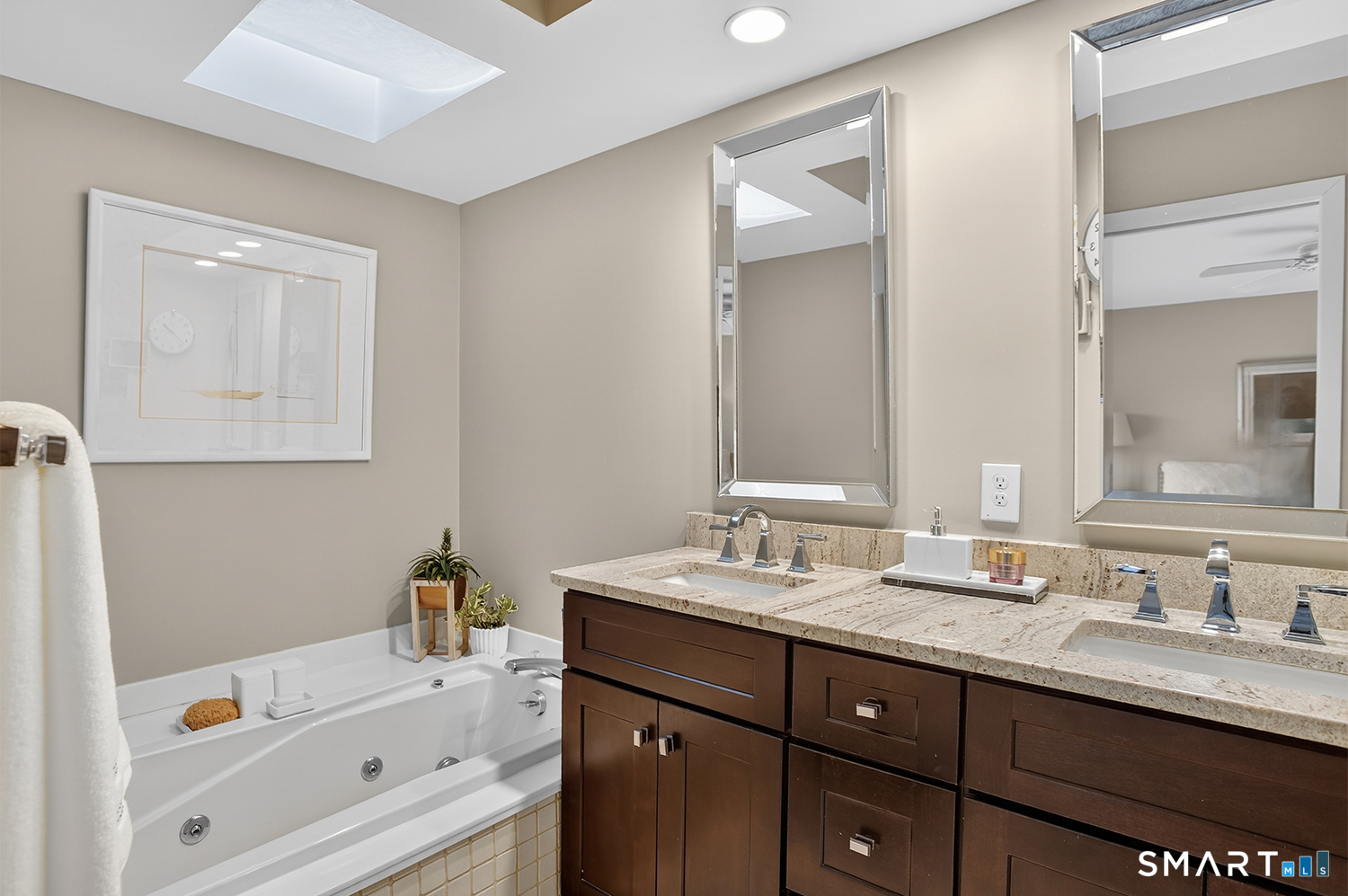 23 Balmaha Cl Fairfield, CT 06825 - Photo 18 of 29 a bathroom with a tub sink double vanity and mirror