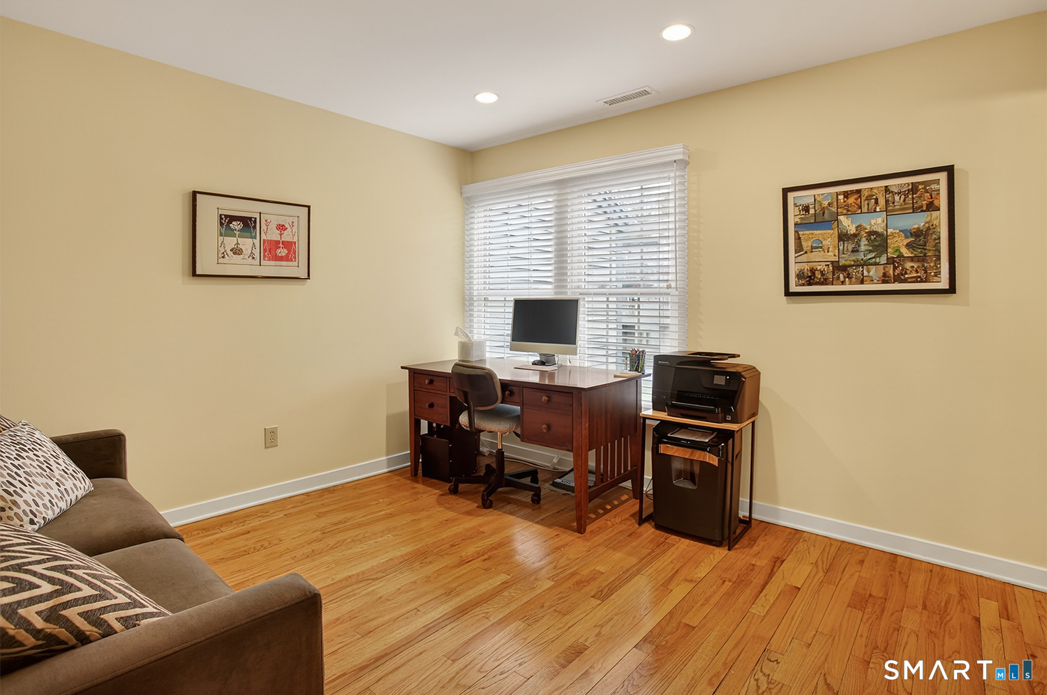 23 Balmaha Cl Fairfield, CT 06825 - Photo 22 of 29 a view of a livingroom with workspace and a couch
