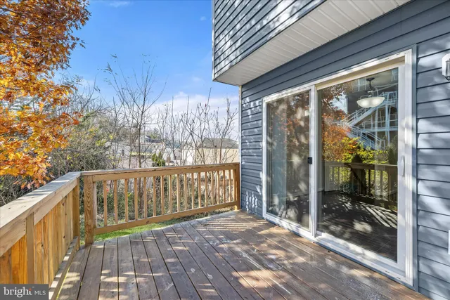 a view of porch with a bench in balcony
