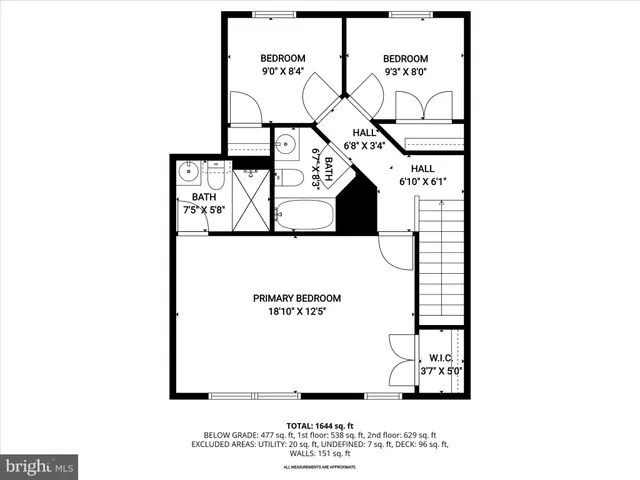 a black and white photo of a living room