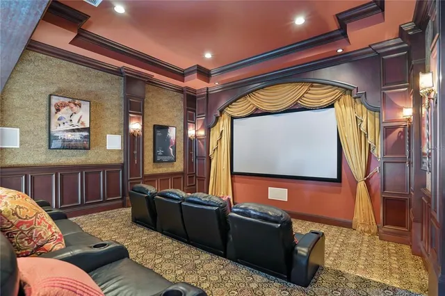 a bedroom with a large bed and a large window