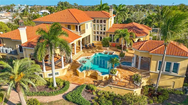 a view of a patio with table and chairs