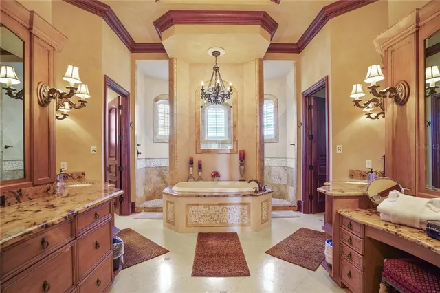 a bedroom with a large bed and a dresser