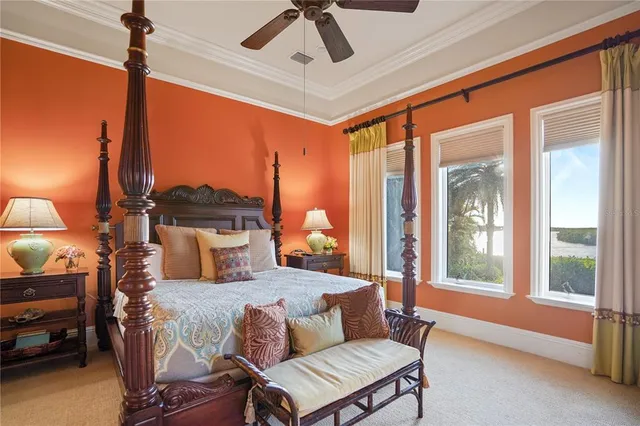 a bedroom with a bed and a couch