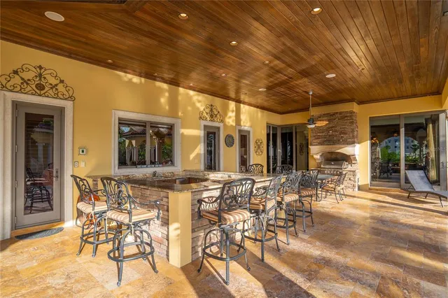 a kitchen with stainless steel appliances granite countertop a stove a sink dishwasher and a refrigerator